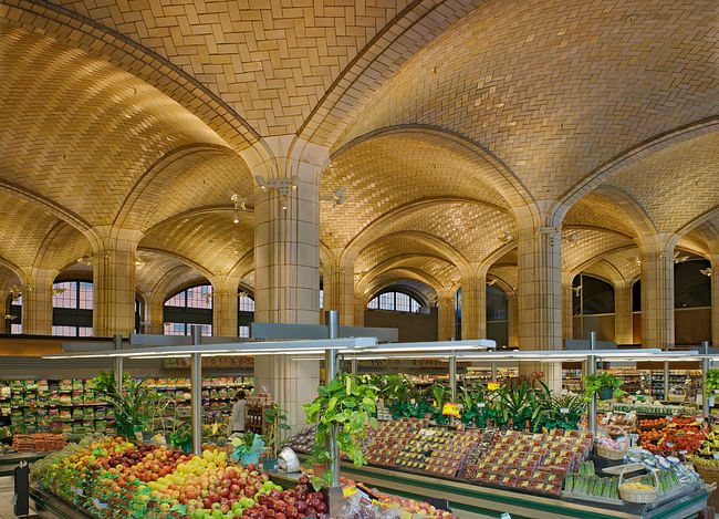 Architect Henry Hornbostel called on the Guastavino Company to design a vaulted arcade below the approach to the Queensboro Bridge, to serve as a public market. Visually, the canopy of tile vaulting transformed a regular grid of columns into a soaring celebration of public space. Photo © Michael Freeman. Courtesy of the Museum of the City of New York 