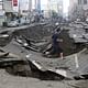 Underground explosions in Kaohsiung, Taiwan's second-largest city, caused deep craters in roads. Zuma Press, image via online.wsj.com.