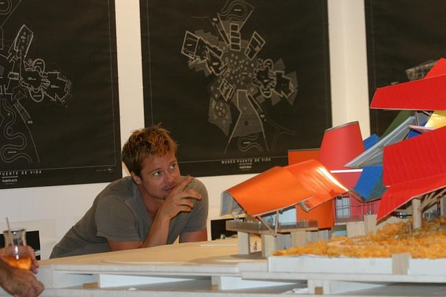 Brad Pitt looking at model for Frank Gehry designed Biomuseo in Panama