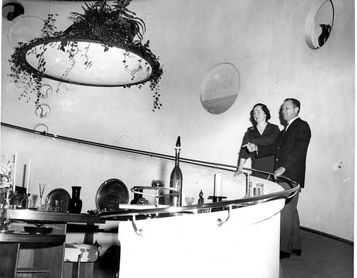 The V.C. Morris gallery as it appeared in 1960 when Allan Adler — described by The Chronicle as a “famed silversmith” — purchased the shop from the estate of the owners who hired truly famed architect Frank Lloyd Wright to transform the space in the late 1940s. Adler is on the right. (Berge Studio) Image via sfchronicle.com.