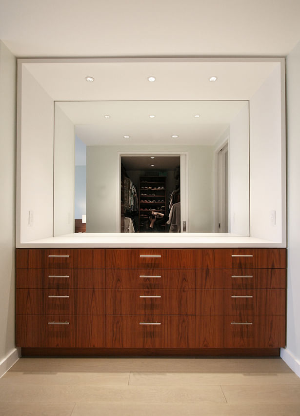 Built-In Master Dresser with Corian Sleeve Opposite Master Closet