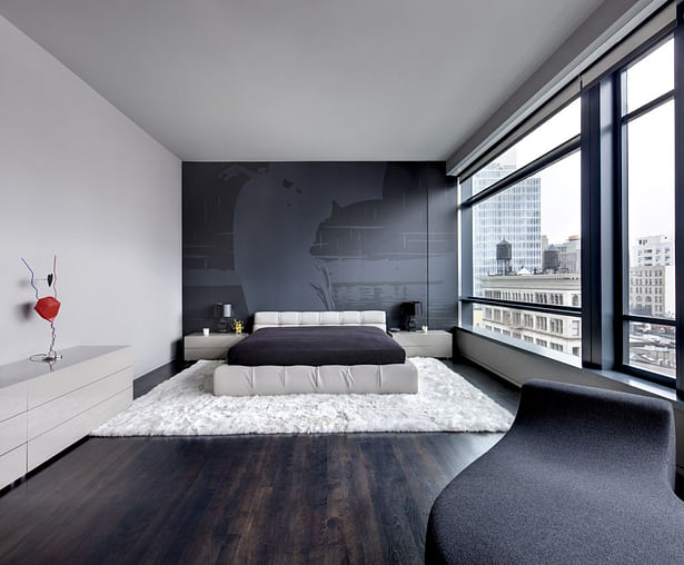 Master Bedroom with custom designed glossy lacquer desk with stainless steel leg, Poliform queen bed and Minotti glass book shelving on the wall.