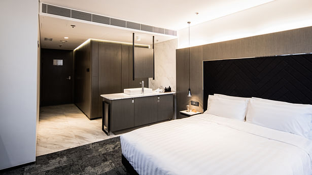 Hotel rooms - the hotel rooms are modern, practical and family-friendly with the use of white marble against shades of navy blue and black to increase the sense of space. 