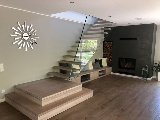 Floating Mistral design staircase supported by single sheet of low iron structural glass. 