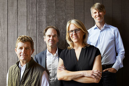 Pictured, from left to right, Principals Brooks Walker, Greg Warner, Kathy Scott, and Mike McCabe. Image courtesy of Matthew Millman. 