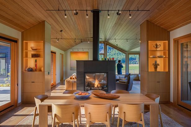 Two-Sided Fireplace Between Dining and Living Rooms