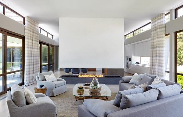Living Room with floating plaster fireplace. Joshua McHugh Photography