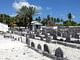 Koagannu Mosques and Cemetery, Maldives: A historic waterfront cemetery with distinct coral - stone architecture is threatened by rapidly rising seas and highlights the urgency of the climate crisis and the need for adaptive preservation solutions. Pictured: View of Koagannu Cemetery. Image...
