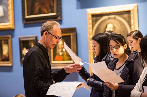 Composer Michael Harrison conducting the RISD students at the 'In C' performance. PHOTO: JO SITTENFELD/RISD