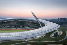 MAD Architects' newly-completed Quzhou Sports Park hovers over the Zhejiang Province in China