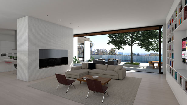 The family room area, anchored by a fireplace. The white brick wall divides this space from the kitchen and dining area. This room also opens up directly to the pool terrace. A wood awning can be seen over the opening, providing needed screening of the afternoon sun.