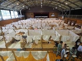 Shigeru Ban builds temporary shelter for flooding victims in Japan