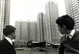 Two boys look at the newly constructed Red Road flats, then the highest in Europe, in November 1967. Photograph: Bob Thomas/Getty. Image via theguardian.com.