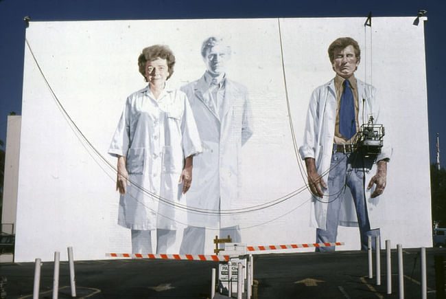 Muralist Kent Twitchell working on 'Holy Trinity with the Virgin' on Wilshire Blvd in 1978. (Anne Laskey/Courtesy LA Public Library)
