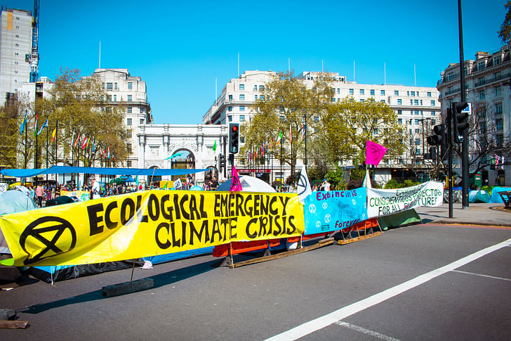 Extinction Rebellion protesters demonstrating for climate action at an April 20th, 2019 rally in London. Image courtesy Wikimedia Commons user Alexander Savin. (CC BY 2.0).