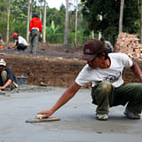 Smoothening the concrete floors (Photo: Zifeng Wei)