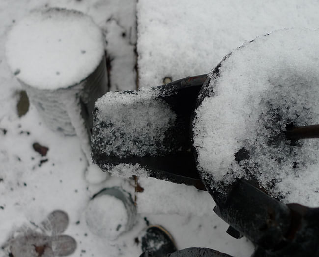 Pump and watering can at rest for winter