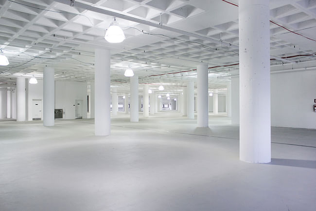 'The building’s massive floor plates (ranging from 8,000 m2 to 11,500 m2 / 86,000 sf to 124,000 sf) and unusually high ceilings (typically 5 m / 16.5 ft) provide a huge amount of uniquely dimensioned, free plan “support space” for Manhattan West’s and Hudson Yards’ significant injection of traditional Class A offices.' Image courtesy of REX.