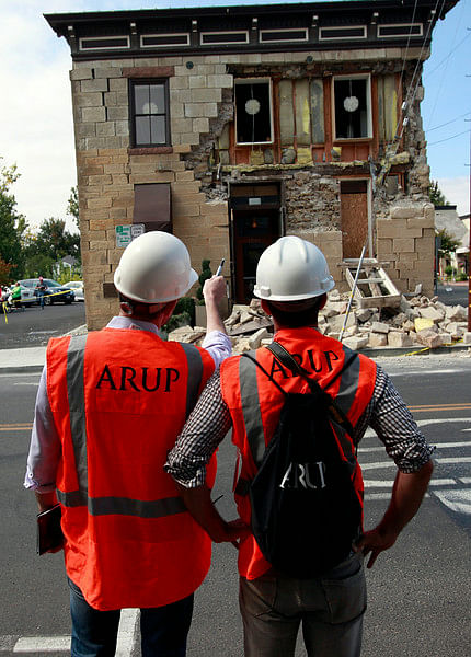 Engineers surveying damage caused by the Napa Quake. Credit: Karl Mondon/Bay Area News Group