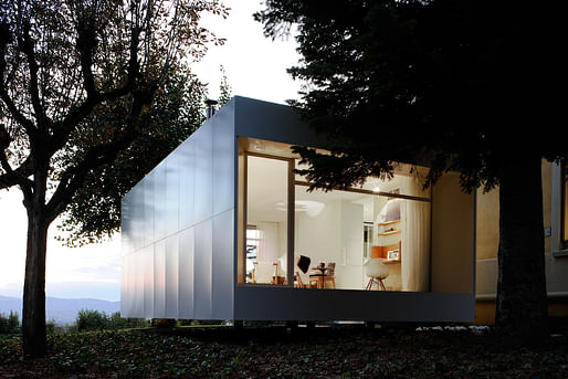 Playtime's house extension, viewed at twilight. All photos by Studio Erick Saillet.