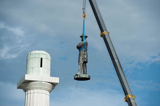 View of a statue commemorating confederate general Robert E. Lee being removed in New Orleans in 2017. Photo courtesy of Wikimedia user<a href="https://commons.wikimedia.org/wiki/File:Lee_Removal.jpg">Abdazizar</a>