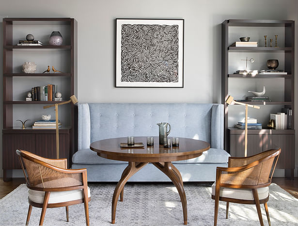 The custom-designed Niche Interiors banquette, Alfonso Marina chairs and Dessin Fournir table often host family game nights.