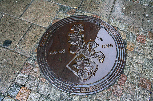 Malmö's crest on manhole cover