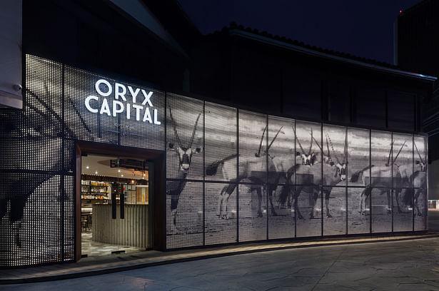 A photograph of a herd of Oryx was imprinted onto a series of perforated sheets in order to form the project's facade. In doing so, the project's exterior, like its interior, establishes its own unique design language.
