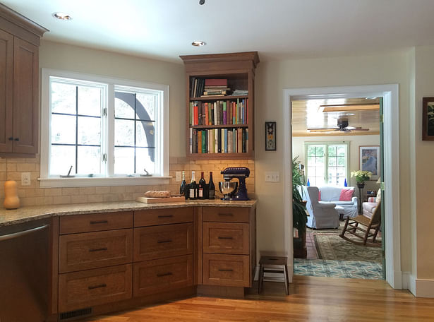 The kitchen opens to the sunroom in a new way