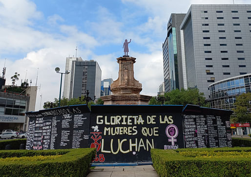 The "Glorieta de las mujeres que luchan" ("Women Who Fight Roundabout") anti-monument as it appeared in October 2021 in Mexico City. Image (cropped) courtesy Wikimedia Commons user <a href="https://commons.wikimedia.org/wiki/File:Vista_de_la_antimonumenta_en_la_Glorieta_a_las_mujeres_que_luchan_02.jpg">B.jars</a> (CC BY-SA 4.0).