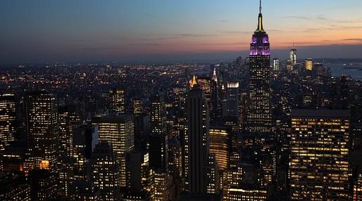 The Empire State Building towers over the Manhattan skyline in New York City. The owners of the Empire State Building have registered to sell shares to the public. (Image: John Moore/Getty Images via marketplace.org)