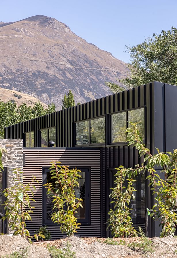 Lake Hayes Home, Queenstown, by Ben Hudson Architects - stone, cedar and metal cladding