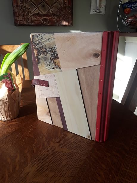Newly completed portfolio binder, mostly made from scrap pieces of wood found in the garage.