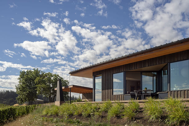 Indoor-outdoor living is an idea built into the home, with many spaces opening up to connect the interior and exterior. PHOTOGRAPHER: Andrew Pogue