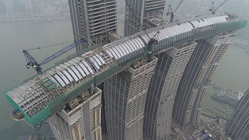 Moshe Safdie's Chongqing megadevelopment—featuring the world's highest, tower-spanning sky bridge—reaches structural completion