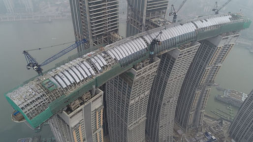 Aerial view of 'The Crystal' sky bridge, centerpiece of the now structurally completed Raffles City Chongqing megastructure. Image: CapitaLand.