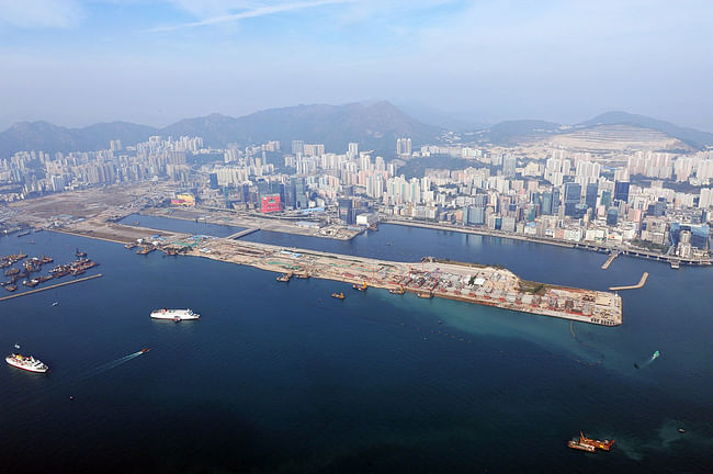 Aerial view of Kowloon East, former Kai Tak airport (foreground and left), Kowloon Bay (centre) and Kwun Tong district (right).