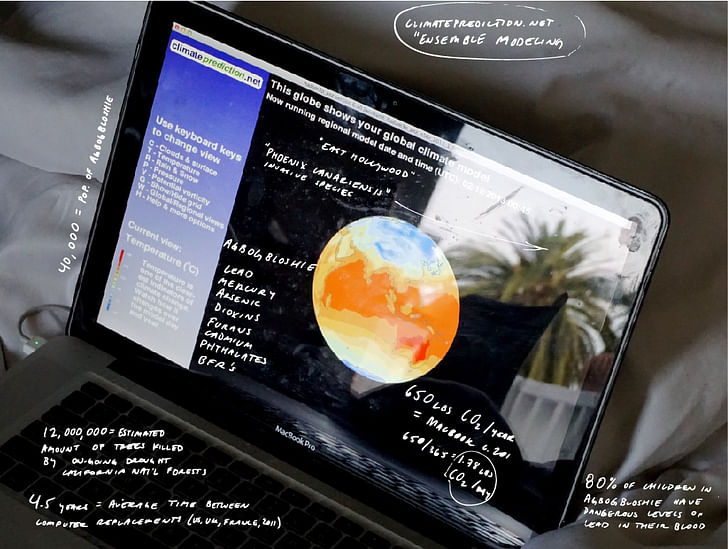 Incomplete annotation of a photograph of the author's computer running a climate model on the author's bed. Image by author.