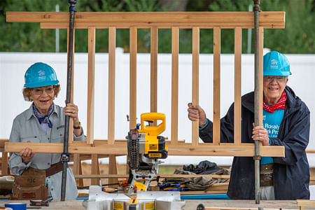 Former U.S. President Jimmy Carter and former First Lady Rosalynn Carter volunteering for Habitat for Humanity. Courtesy Habitat for Humanity.