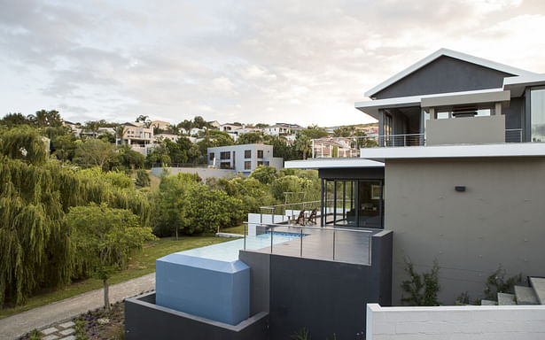 Pool and house in the background David Ross Photography