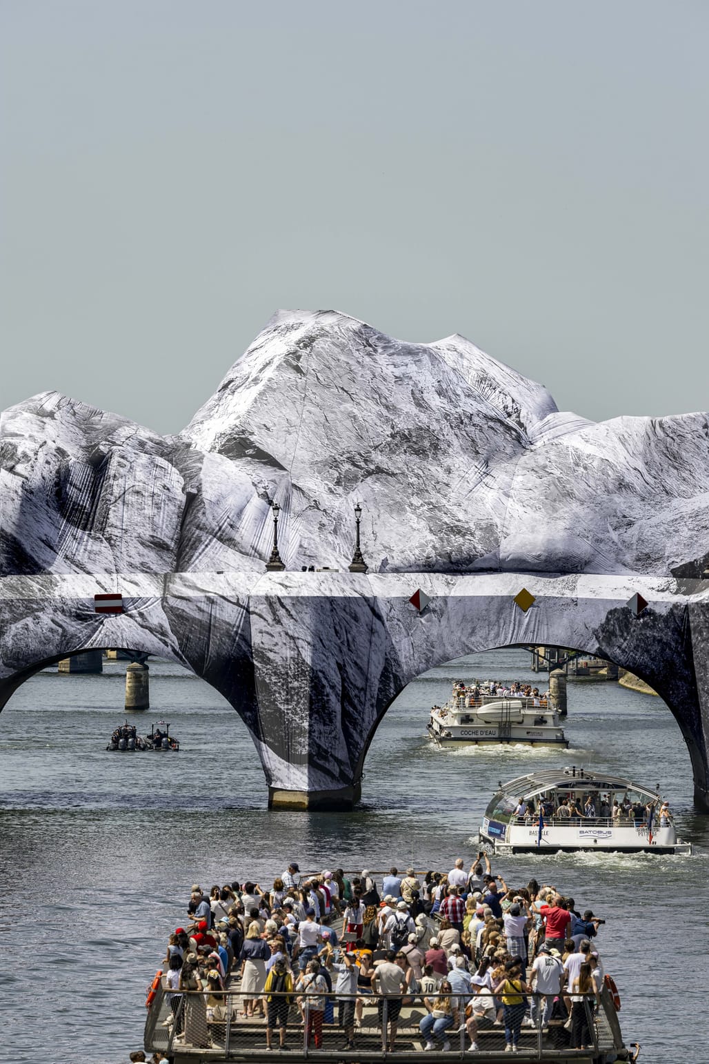 JR wraps Paris' Pont Neuf in inflatable fabric skin in tribute to