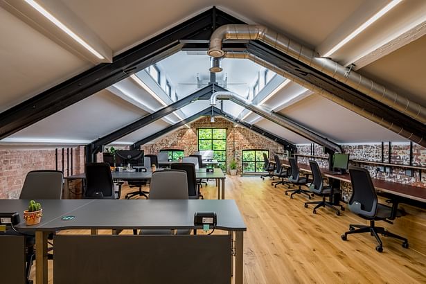 The first floor is a quieter working space with fixed and allocated desking
