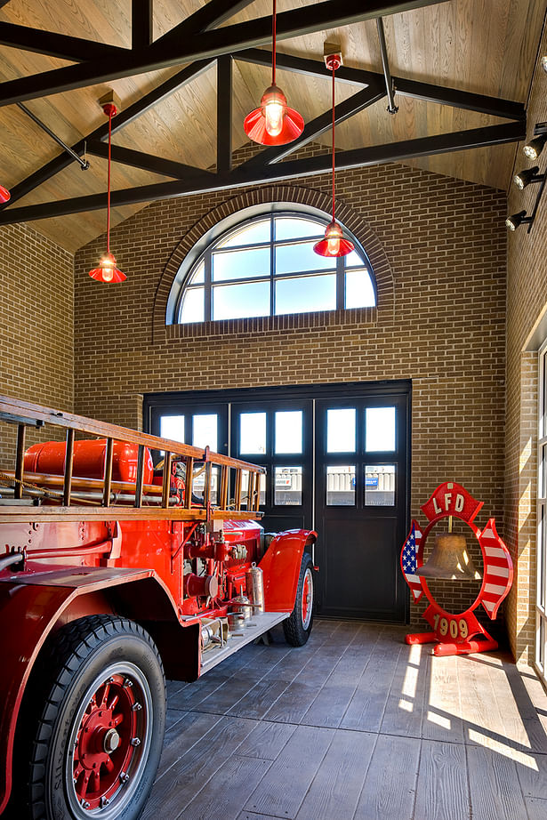 Lubbock FS 1 Lobby with vintage fire engine display. (WHJ)