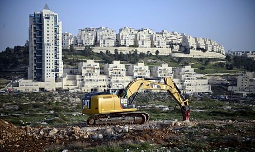 The Israeli settlement of Har Homa in East Jerusalem – Riba says the IAUA is complicit in 'land grabs, forced removals … and reinforcement of apartheid”. (The Guardian; Photograph: Mahmoud Illean/Demotix/Corbis)