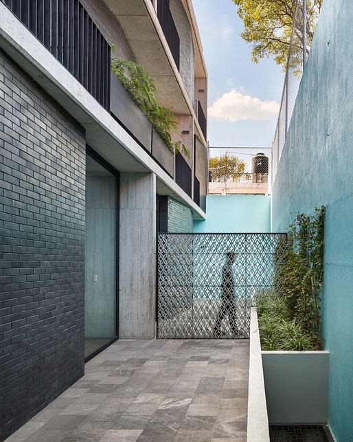 Fernanda Canales' Vivienda Portales housing scheme in Mexico City. Photo credit: Rafael Gamo, image courtesy European Cultural Centre as part of the 2023 <a href="https://archinect.com/news/article/150352601/urban-housing-by-women-led-firms-featured-at-the-2023-venice-biennale"><em>Reconceptualizing Urban Housing exhibition</em></a>.