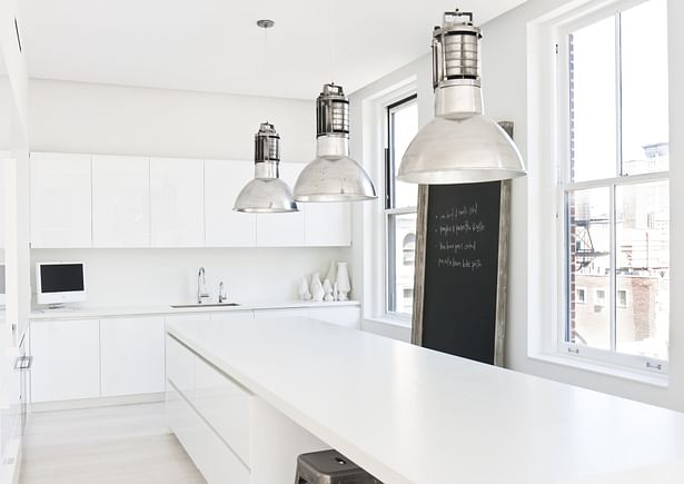 Kitchen with White Corian Countertops