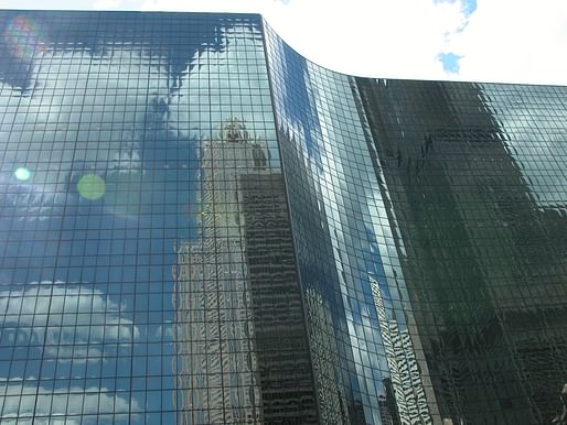 . Photo courtesy of Wikimedia user<a href="https://commons.wikimedia.org/wiki/File:Glass_building_in_Chicago.jpg">Procsilas Moscas</a>