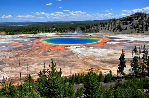 Shown: The Grand Prismatic Spring and Midway Geyser Basin at Yellowstone National Park. Image courtesy Wikimedia user Brocken Inaglory.