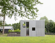Worrell Yeung designs sleek porous spa shed for family home in upstate New York