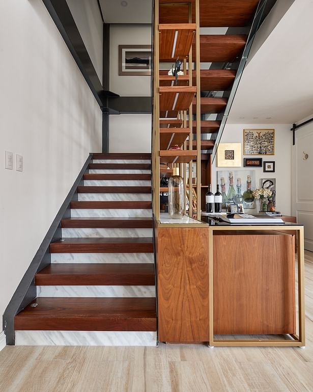 The Stairs gained privacy through a specially designed bar that serves as visual wall